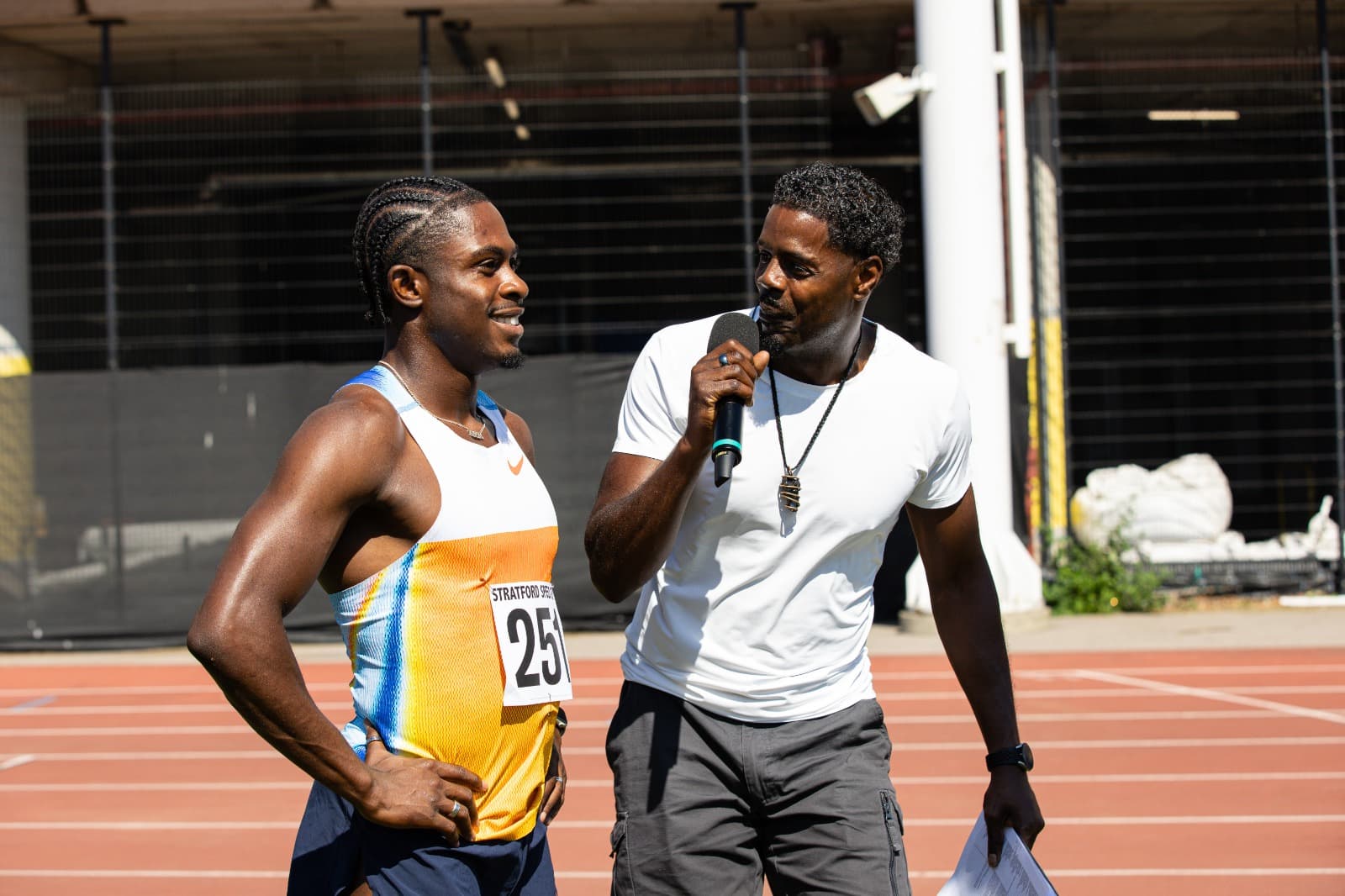 Andre Fernandez coaching on the track